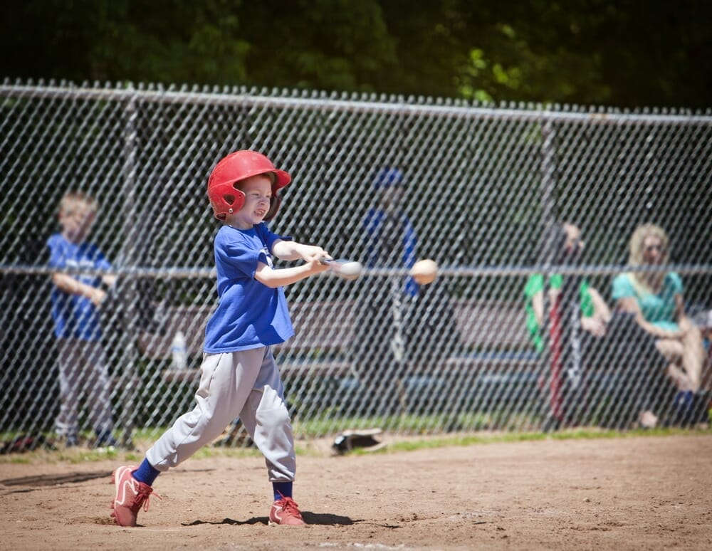 A,Youth,Baseball,Player,Takes,A,Nice,Swing,At,The